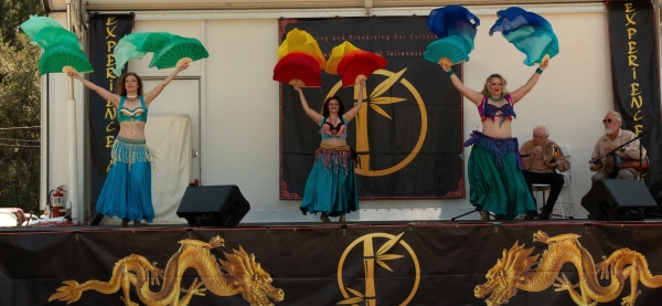 Troupe Arabesque entrance on stage with fan veils